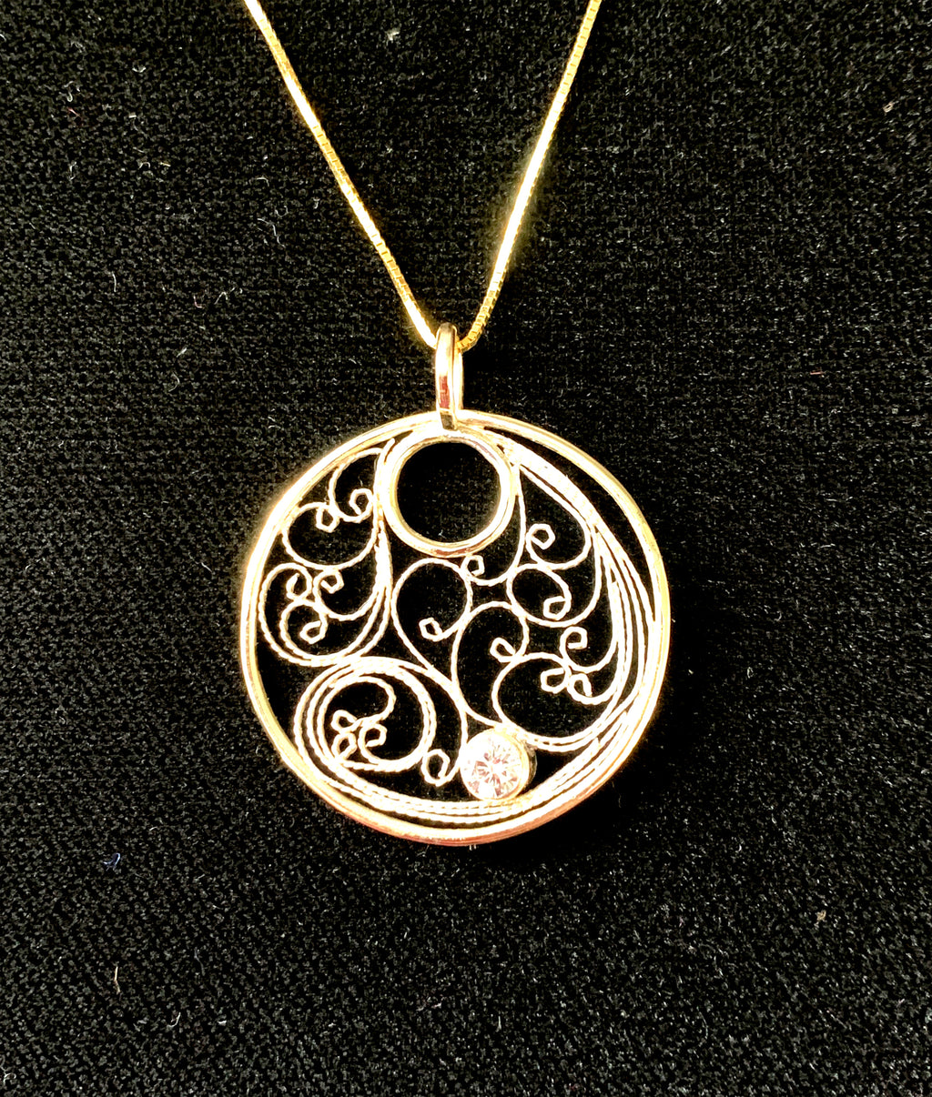 14K yellow gold and fine silver filigree pendant with .25 carat lab created diamond