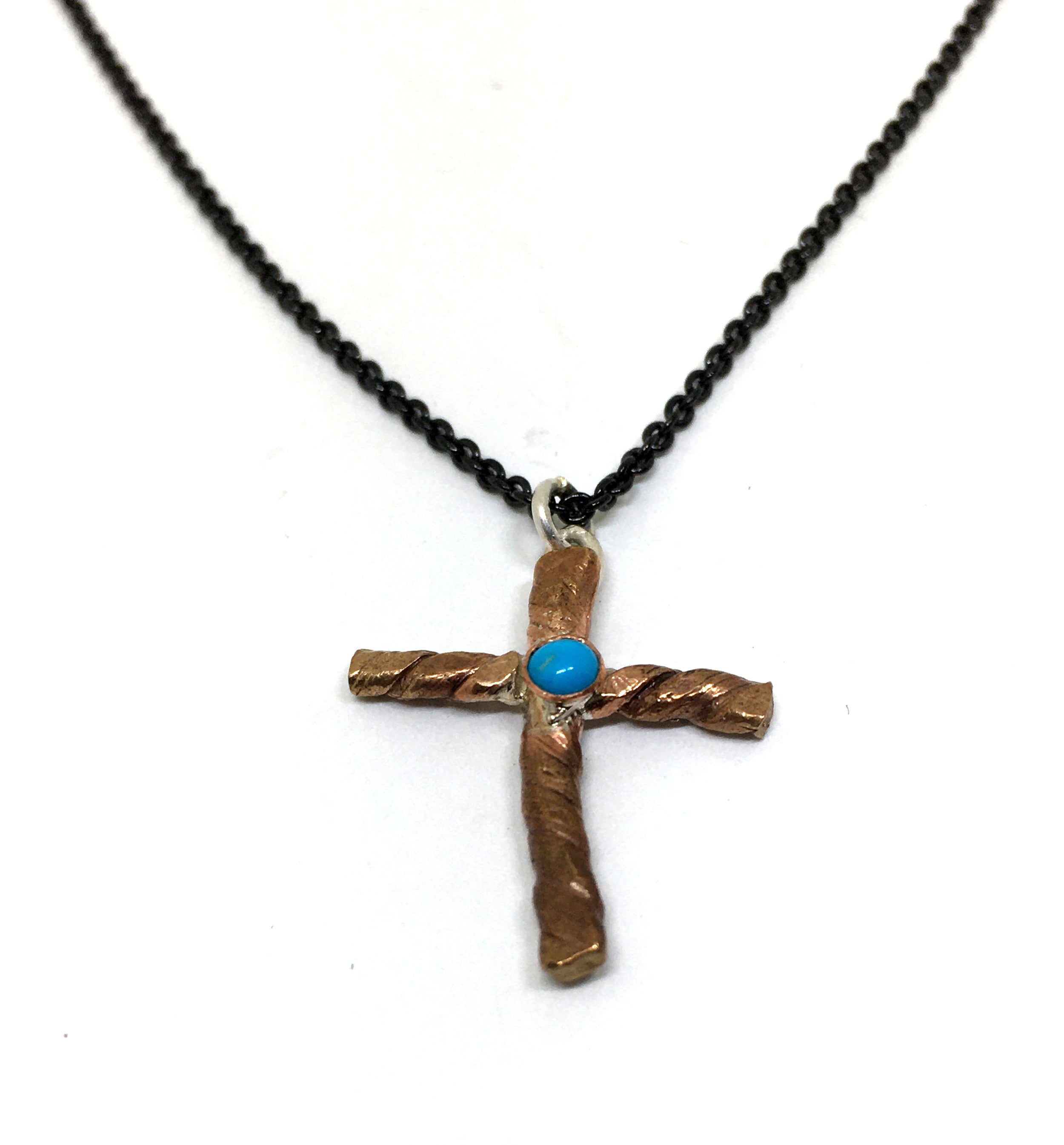 burnished bronze cross with sleeping beauty turquoise