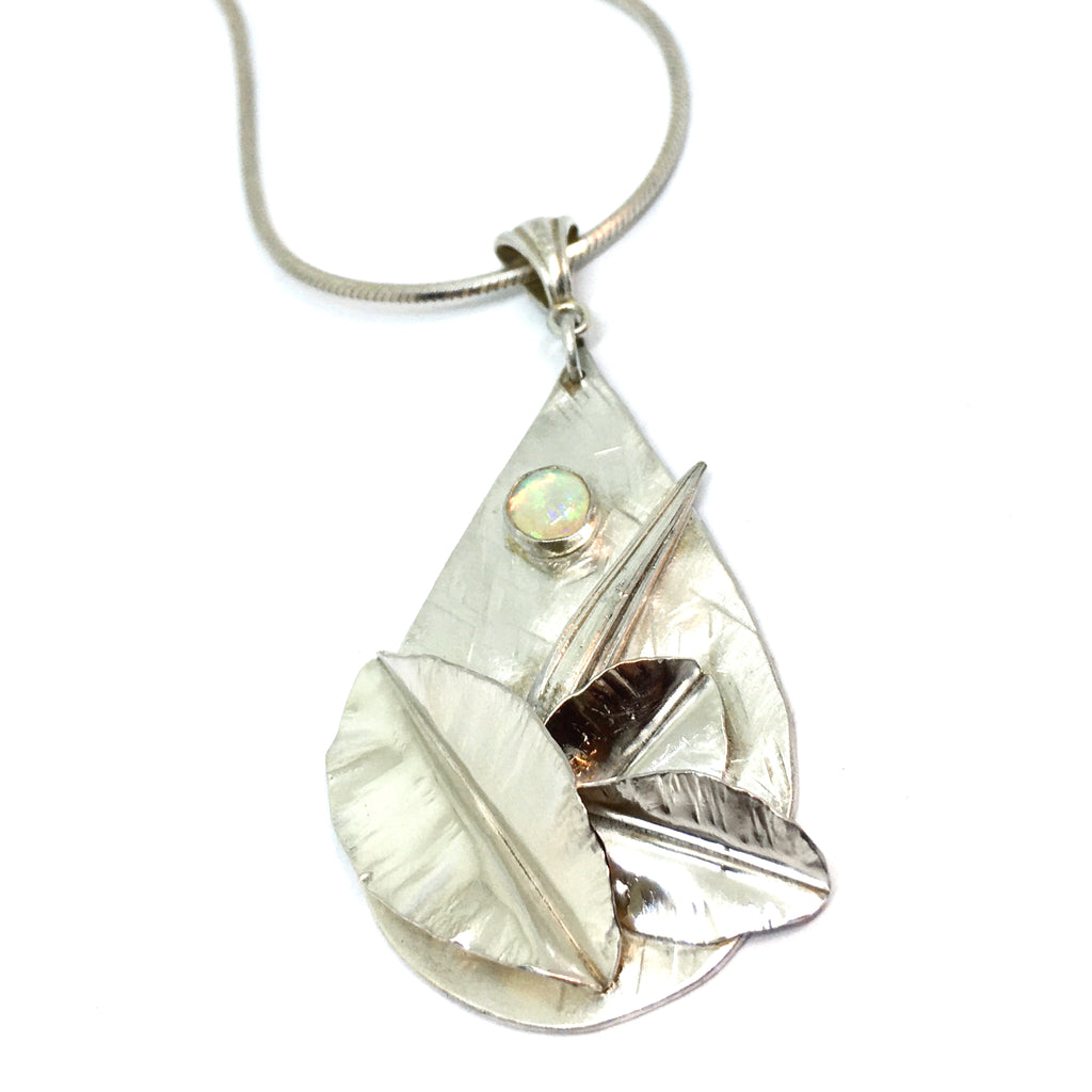 Botanical Opal Pendant with fold formed leaves and mitsuro hikime in sterling silver on snake chain