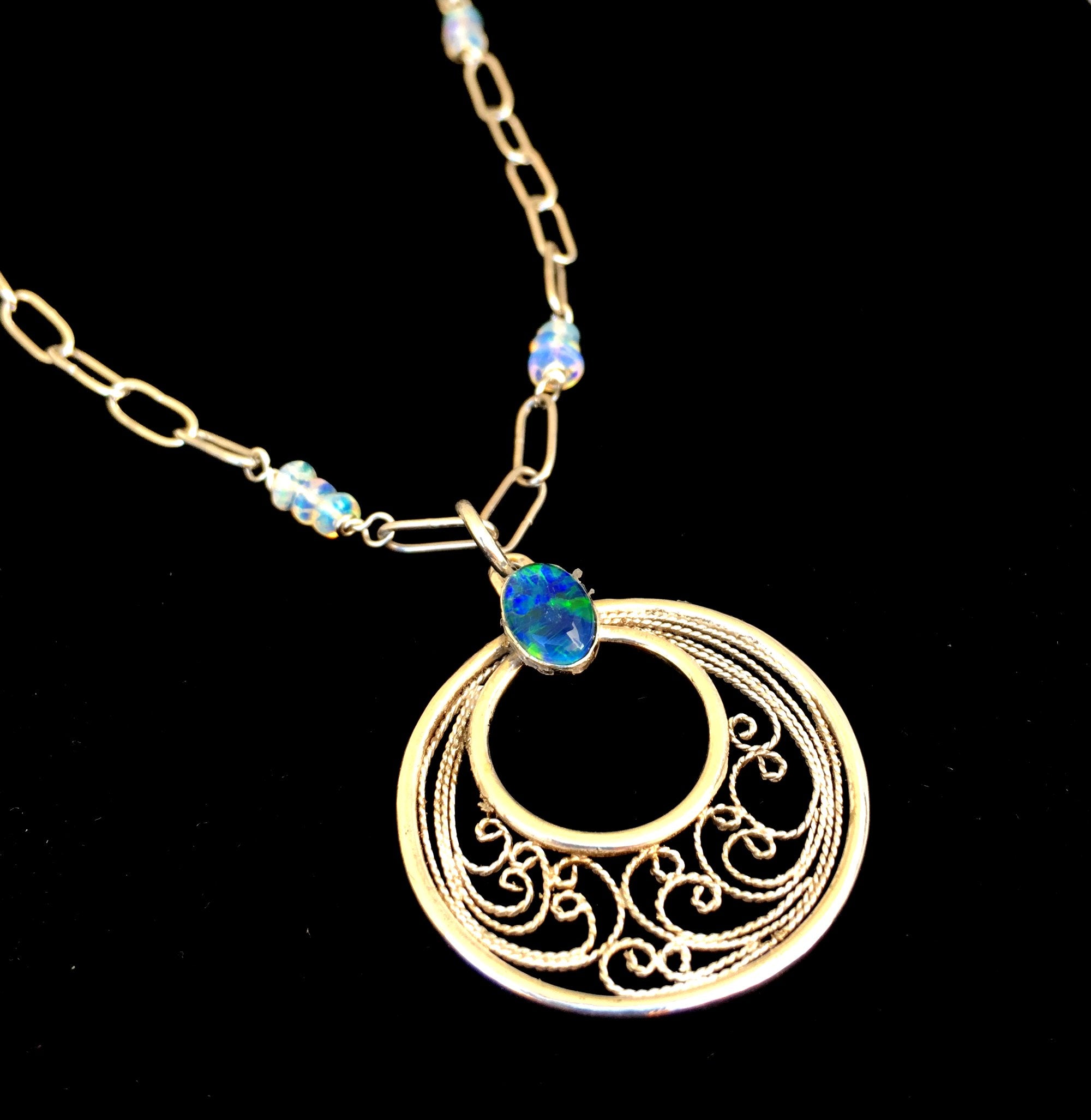 handmade silver filigree pendant necklace with black australian opal