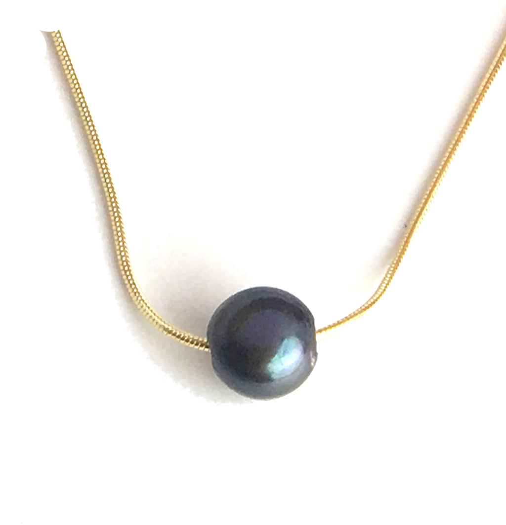 single floating black pearl on gold plated snake chain