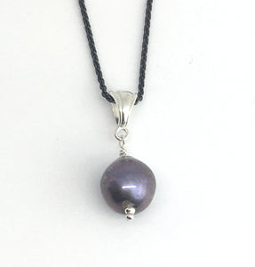 single freshwater purple peacock pearl pendant necklace on black silver chain