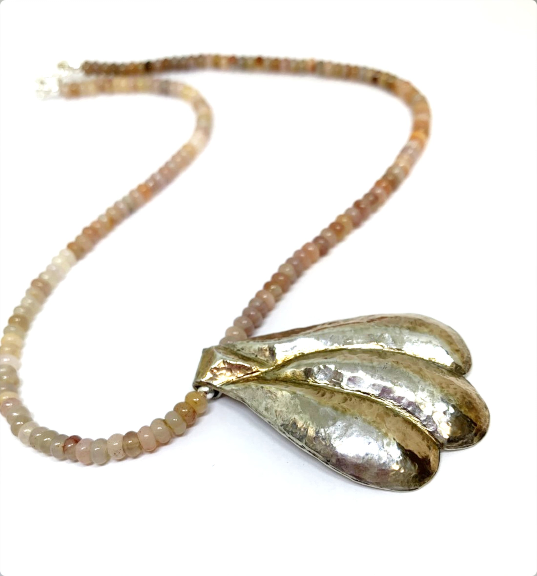 Repousse Pendant with Petrified Wood Beads