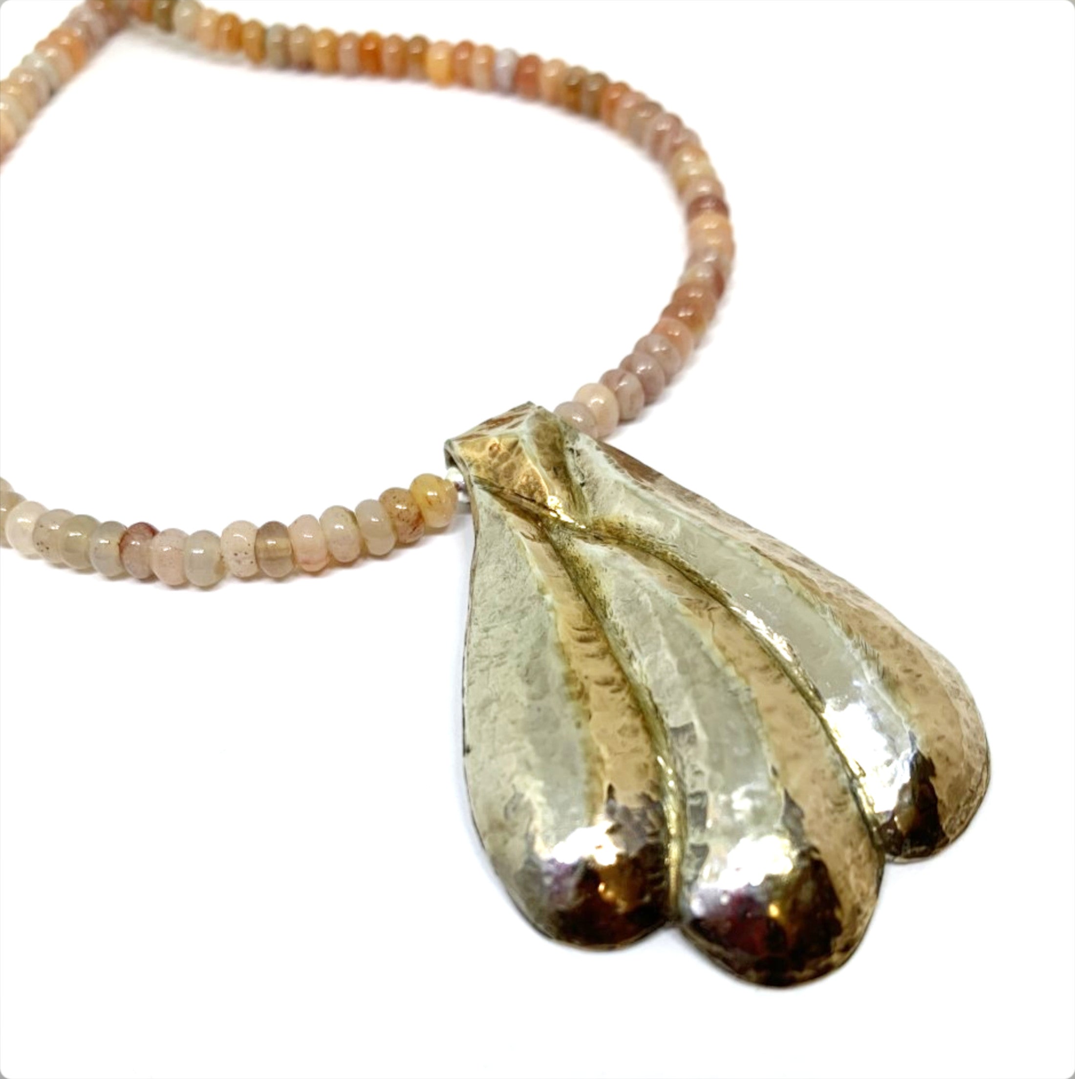 Repousse Pendant with Petrified Wood Beads
