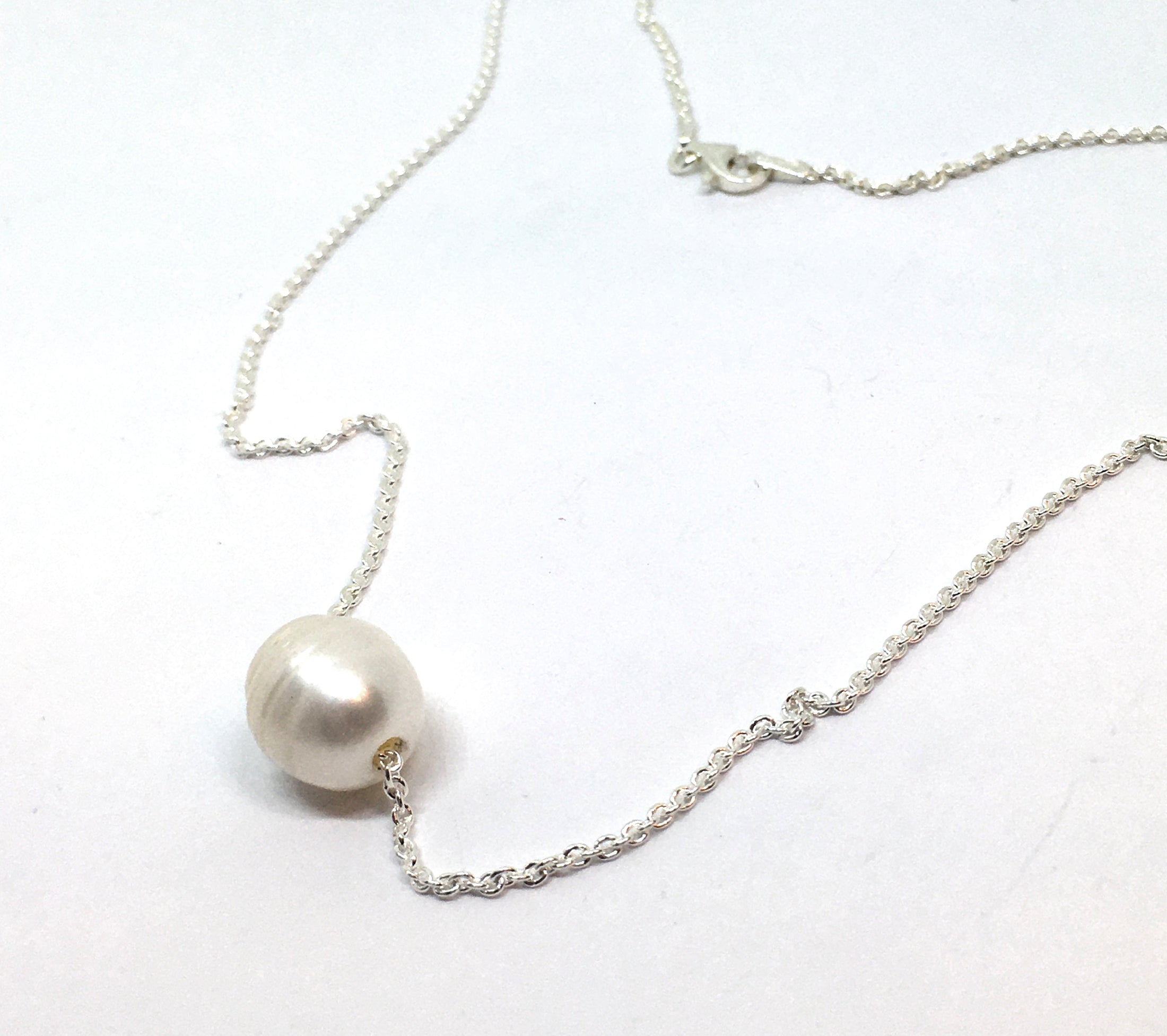Single White Pearl on A Silver Chain