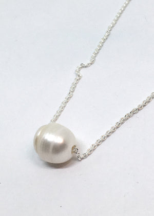 Single White Pearl on A Silver Chain
