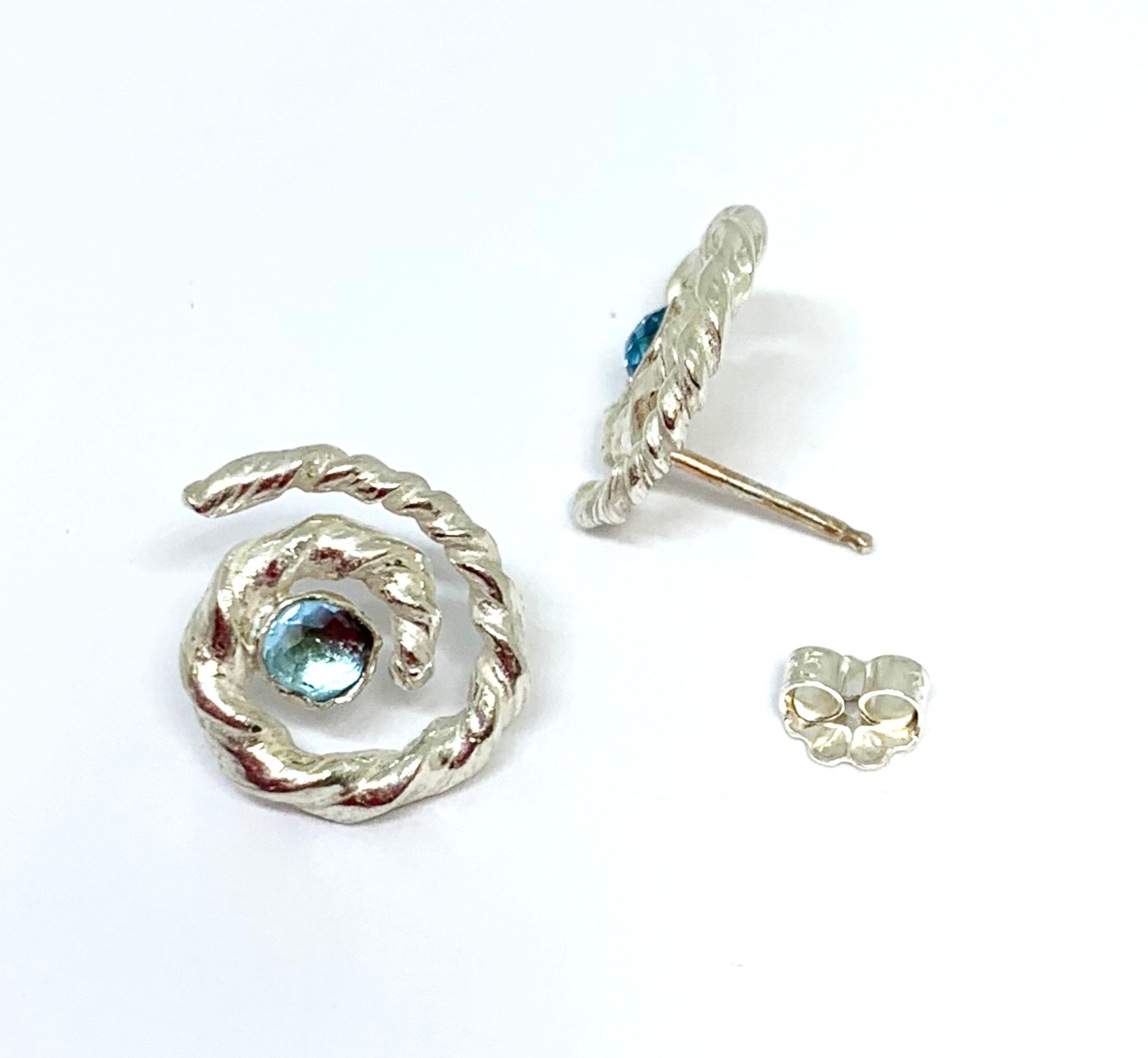 Sky Blue Topaz Spiral Post Earrings in Sterling Silver