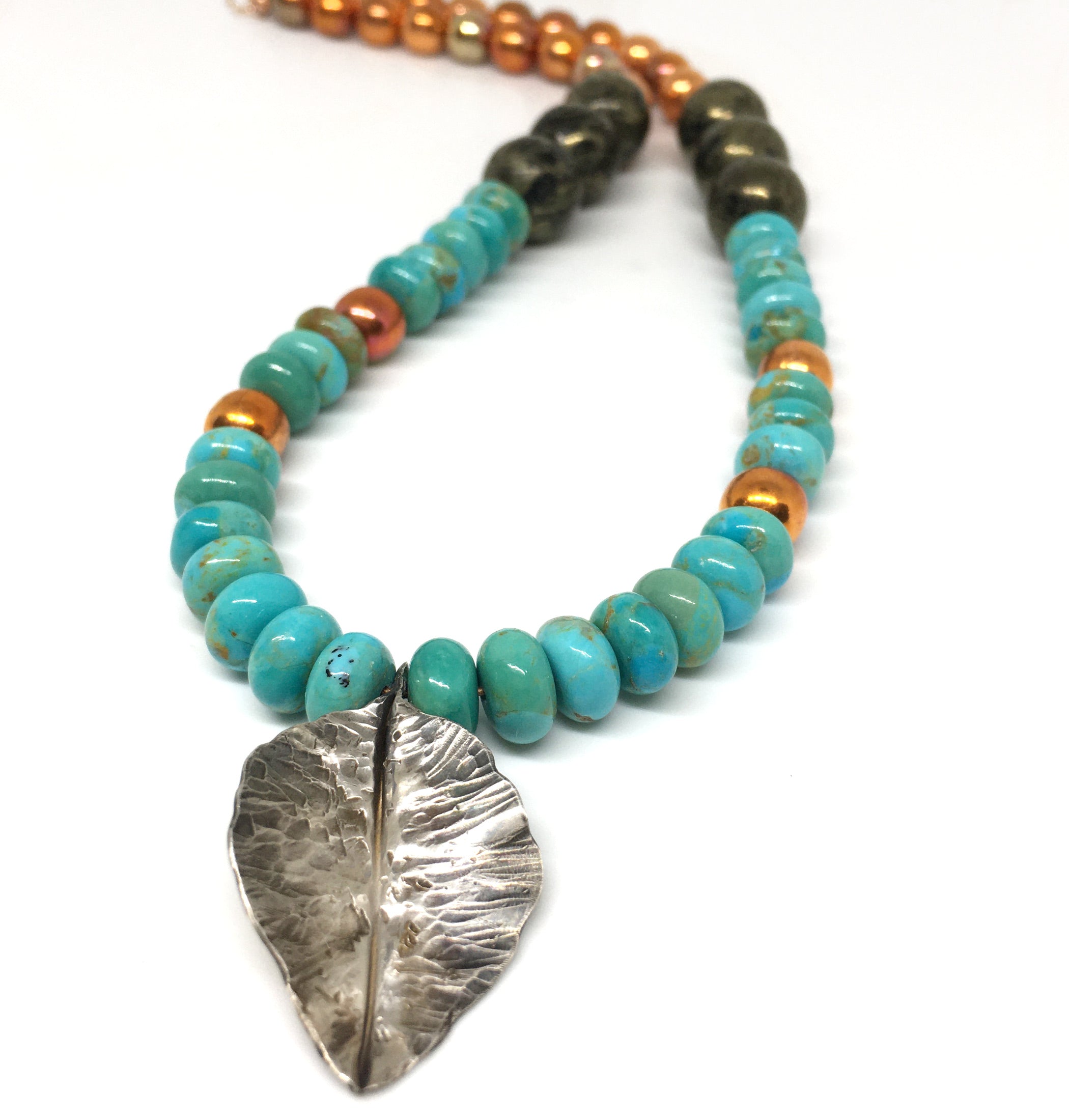kingman turquoise, apache gold gemstone and flame painted copper bead necklace with fold formed silver leaf